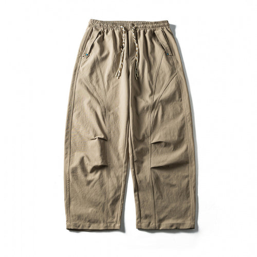 Unisex Weite Cropped-Hose mit Tunnelzug, elastischem Bund und markanten Nahtpaneelen Drune