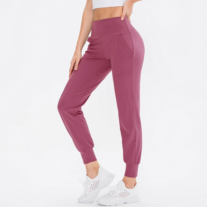 Damen elastische Sporthose mit praktischen Seitentaschen und temperaturregulierendem Material Drune