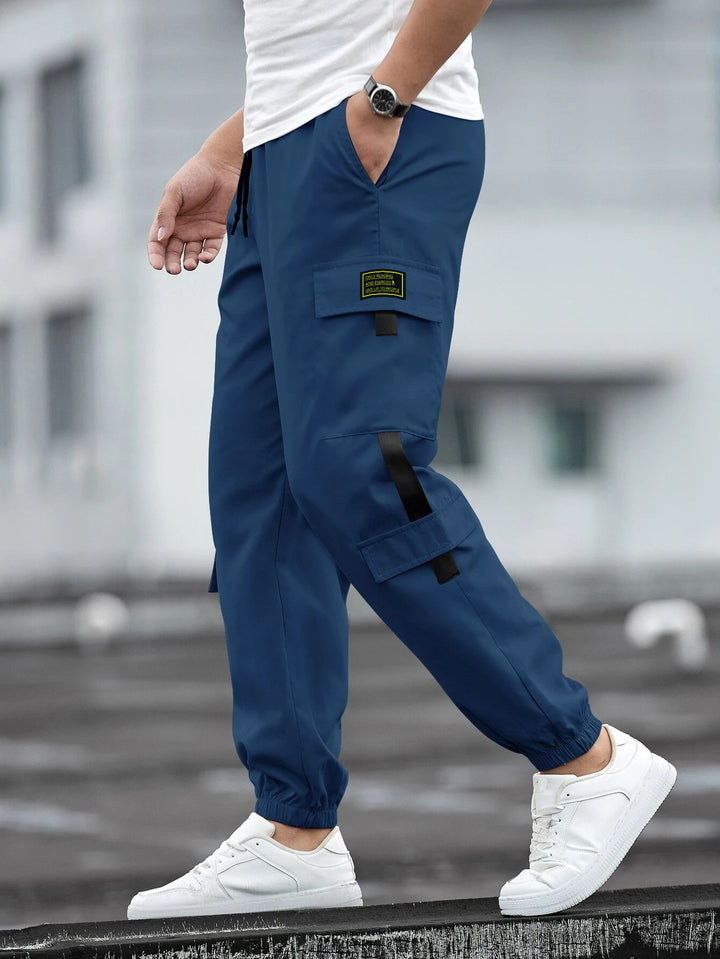 Herren modische Cargo-Joggerhose mit elastischem Bund, Kordelzug und mehreren Sicherheits- und Klappentaschen Drune