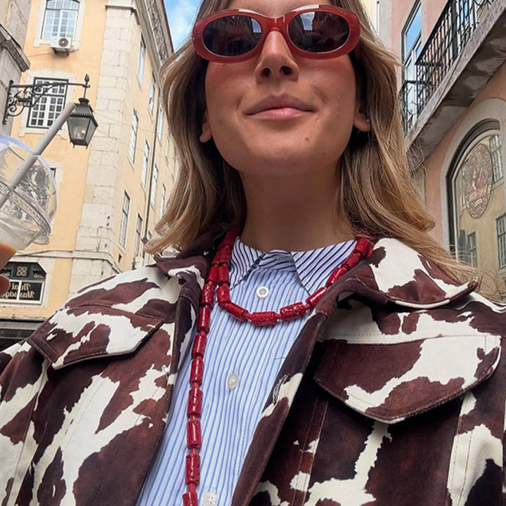 Damen Kunstlederjacke im modernen Cow-Print Design Drune