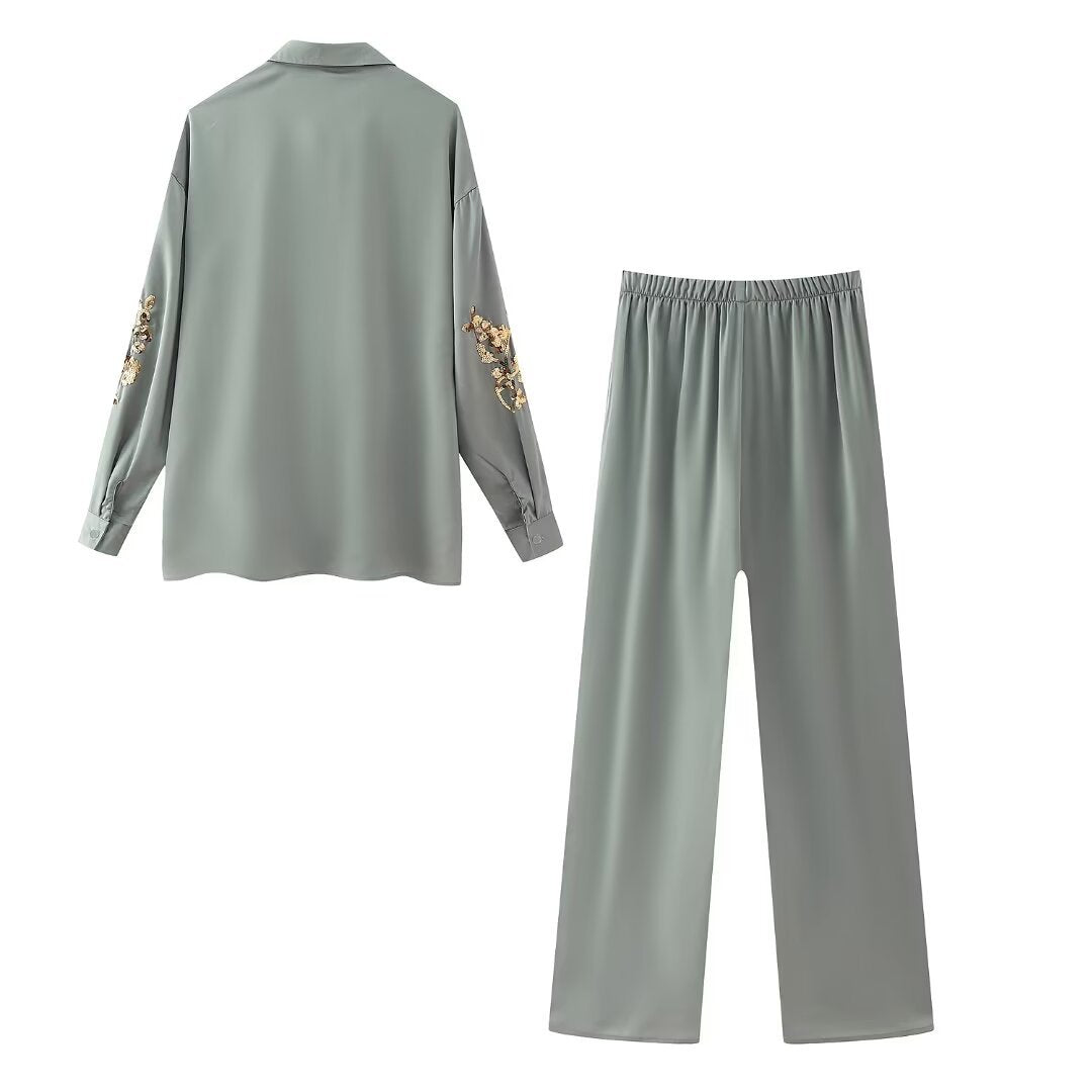 Damen nan weite Satinhose mit elastischem Bund und goldenen Paillettenblüten Drune