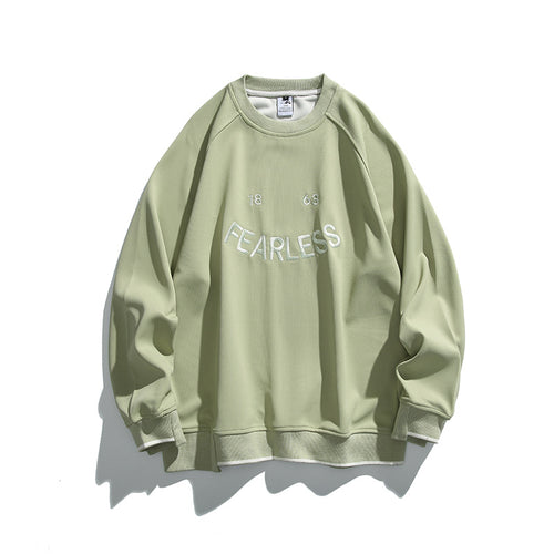 Unisex Oversize-Sweatshirt mit Raglanärmeln und markantem FEARLESS-Frontprint Drune