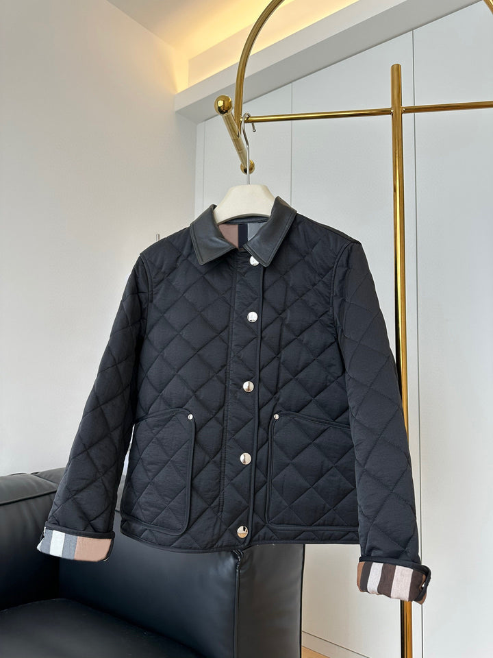 Damen Steppjacke mit Kontrastkragen aus Lederoptik und Druckknopfverschluss Drune