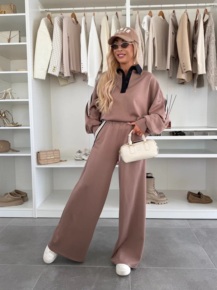 Damen modisches Relax-Set mit Polokragen, markanten Paspelstreifen und weitem Palazzo-Jogger Drune