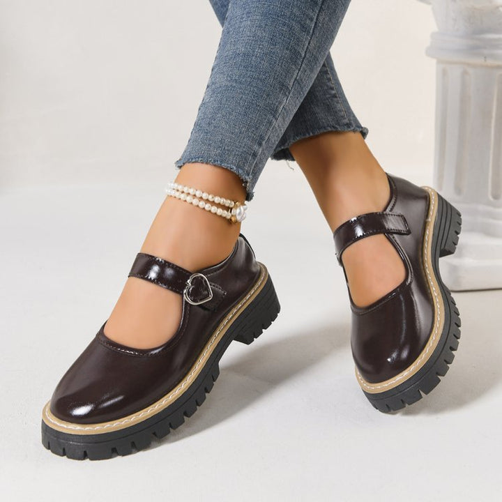 Damen Riemchen‑Slipper im Mary‑Jane‑Stil mit grober Profilsohle und Herzschließe Drune