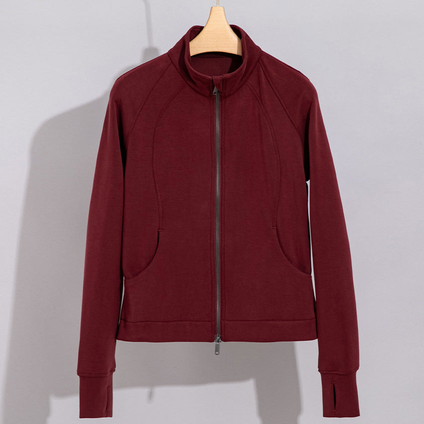 Damen Performance-Trainingsjacke mit Stehkragen und Daumenloch Drune
