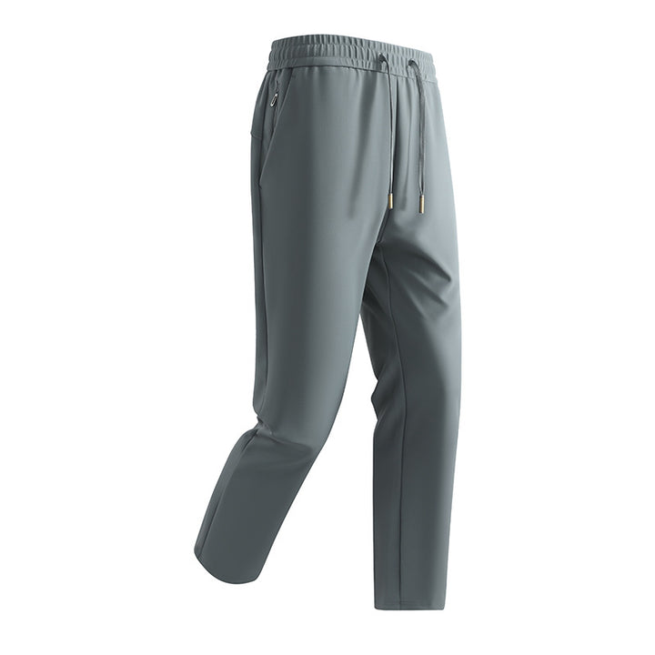 Herren Slim-Tapered Performance-Jogginghose aus wasserabweisendem Funktionsstoff mit elastischem Kordelbund & verdeckten Reißverschlusstaschen Drune