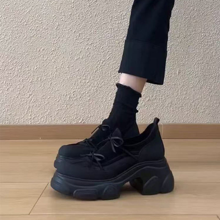 Damen Skulpturale Plateau‑Sneaker mit überhöhter Chunky‑Sohle und dekorativem Schleifenriemen Drune