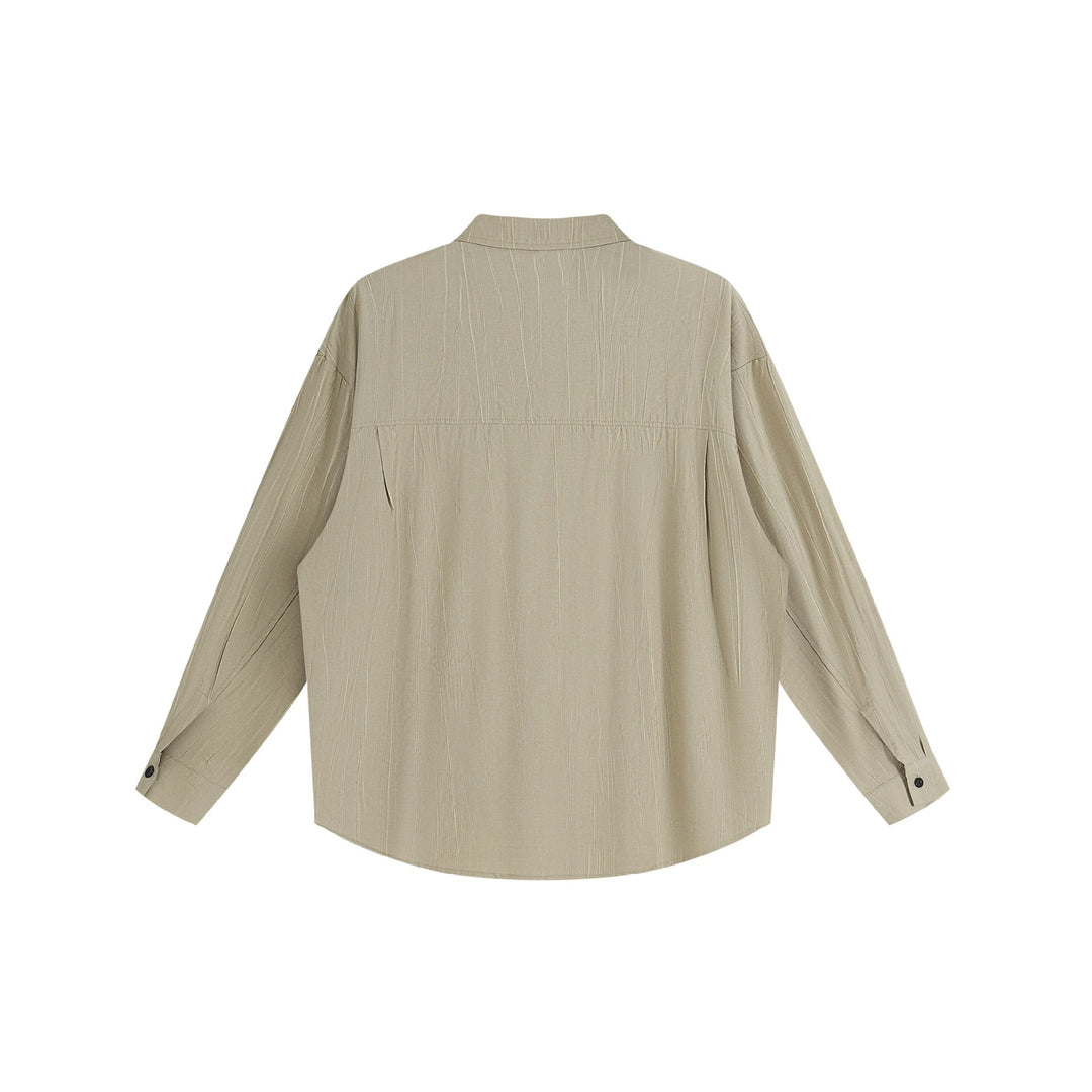 Unisex Oversize Hemdjacke mit strukturierter Längsstruktur, Kentkragen und abgerundetem Saum Drune