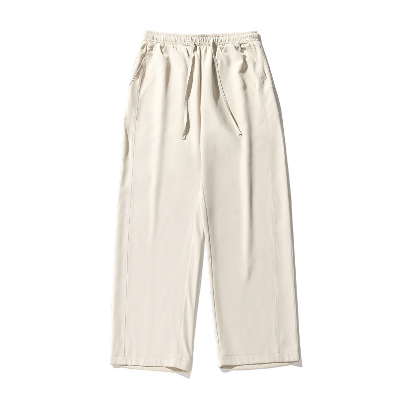 Unisex Locker geschnittene Palazzo‑Freizeithose aus leichtem Twill mit elastischem Bund und Kordelzug Drune
