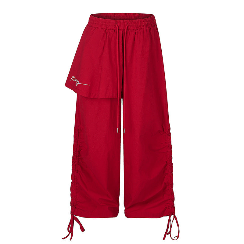 Damen Weite Capri-Hose mit Tunnelzug, seitlicher Raffung und asymmetrischer Überlagerung Drune