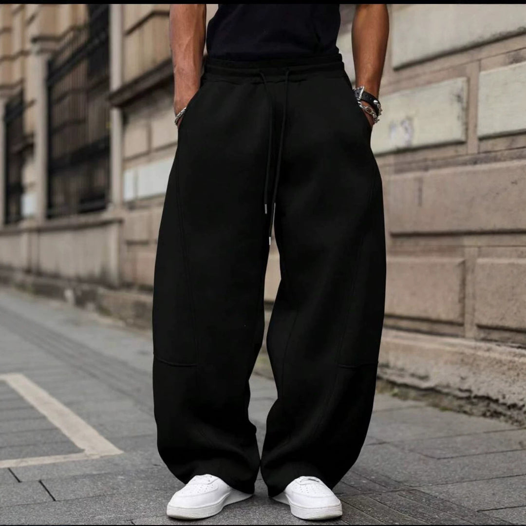 Herren weite Sweatpants im Baggy Cut mit elastischem Bund, Tunnelzug und Eingrifftaschen Drune
