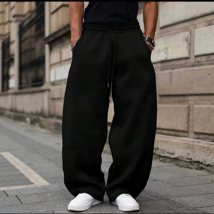 Herren weite Sweatpants im Baggy Cut mit elastischem Bund, Tunnelzug und Eingrifftaschen Drune