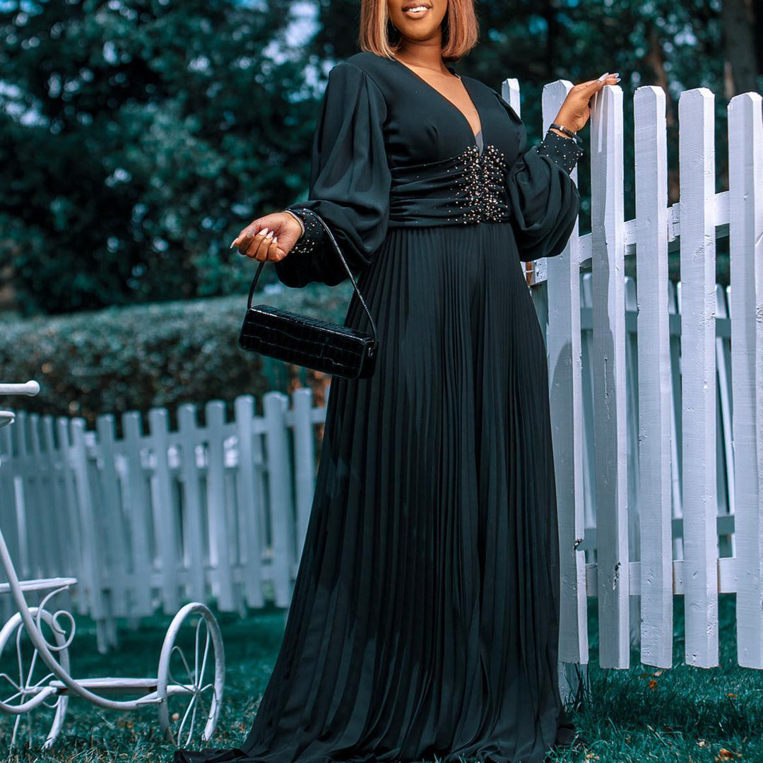 Damen eleganter Jumpsuit mit plissiertem Design und glitzernden Details Drune