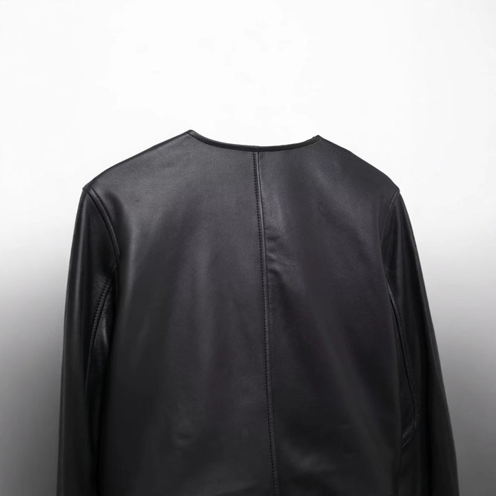 Damen nan cropped Kunstlederjacke mit Rundhalsausschnitt, doppelreihiger Knopfleiste und aufgesetzten Pattentaschen Drune