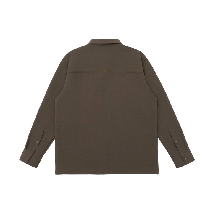 Unisex Oversize-Hemdjacke im Utility‑Style mit verdeckter Druckknopfleiste und diagonaler Reißverschlusstasche Drune