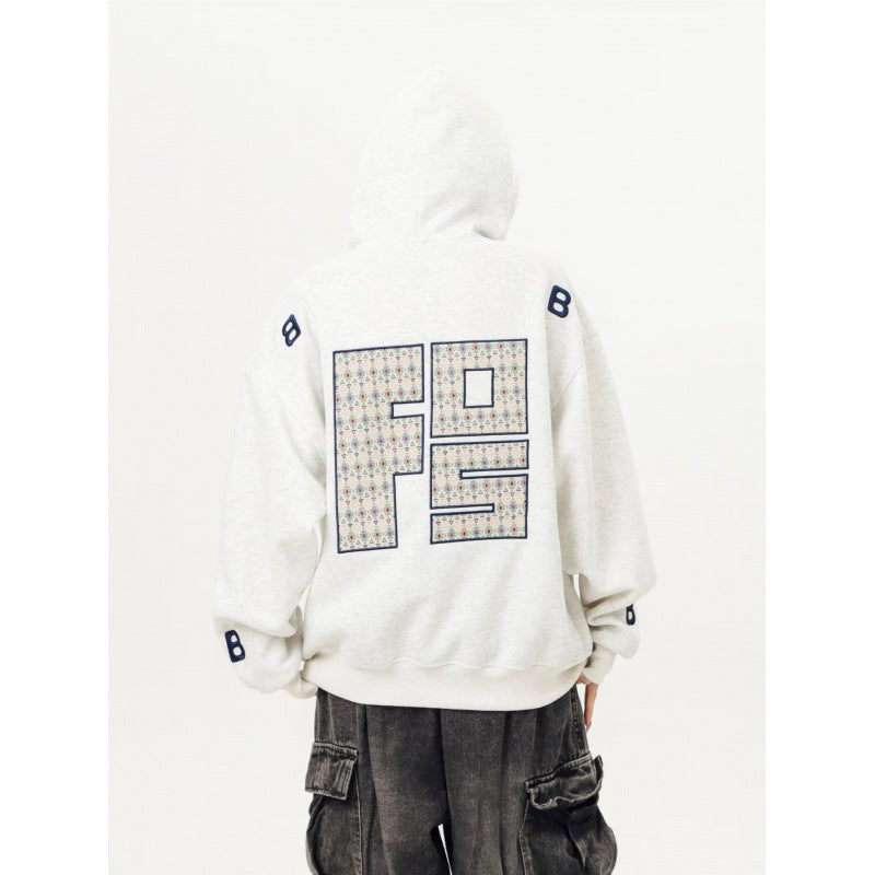 Unisex Oversized Kapuzenpullover mit großflächigem Intarsien‑Blockprint und geripptem Saum Drune
