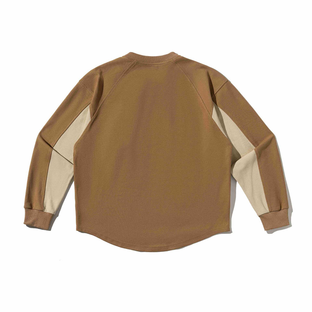 Unisex Raglan‑Sweatshirt mit halbrundem Saum und aufgesetzter Brusttasche Drune
