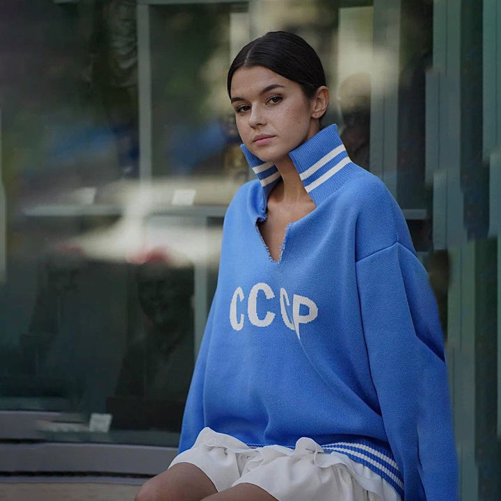 Damen lässiger Pullover mit sportlichem Schriftzug und trendigen Rippabschlüssen Drune