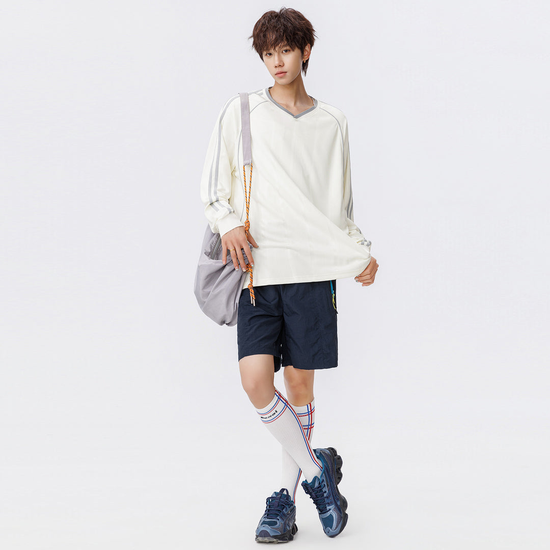 Damen Weites V-Ausschnitt Oversize-Sportshirt mit Raglanärmeln und Kontraststreifen Drune