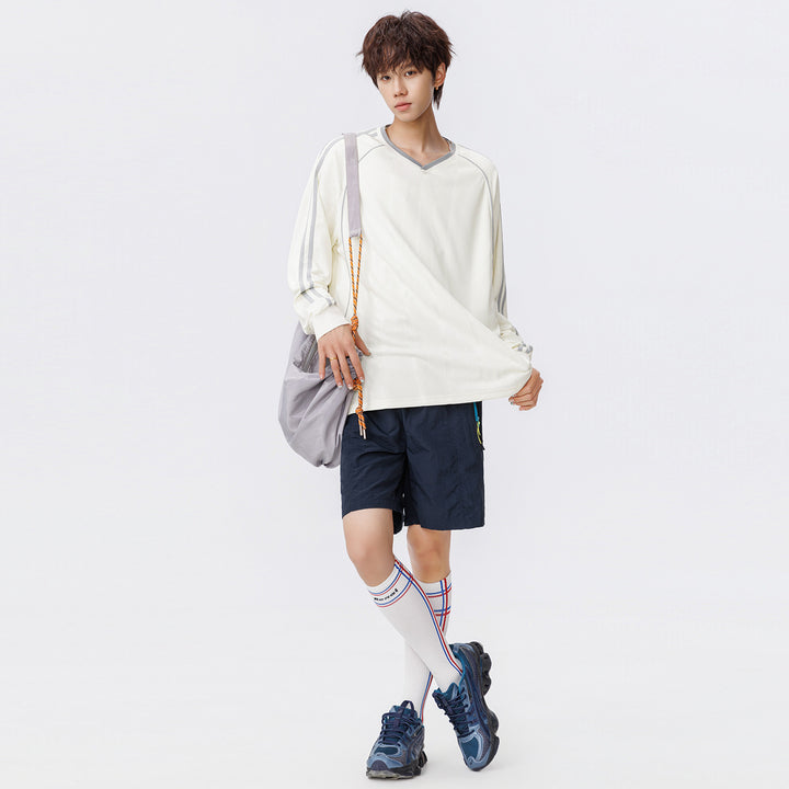 Damen Weites V-Ausschnitt Oversize-Sportshirt mit Raglanärmeln und Kontraststreifen Drune