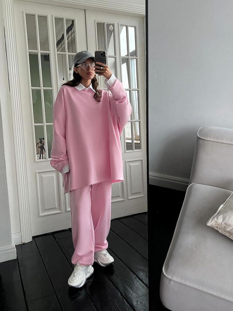 Damen oversized Lounge-Set mit ausgefranstem Saum, extra langem Sweatpullover und weiter hochgeschnittener Jogginghose Drune