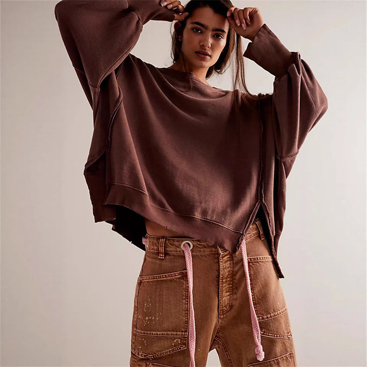 Damen oversized Sweatshirt mit Ballonärmeln, offenen Saumnähten und seitlichen Schlitzen Drune