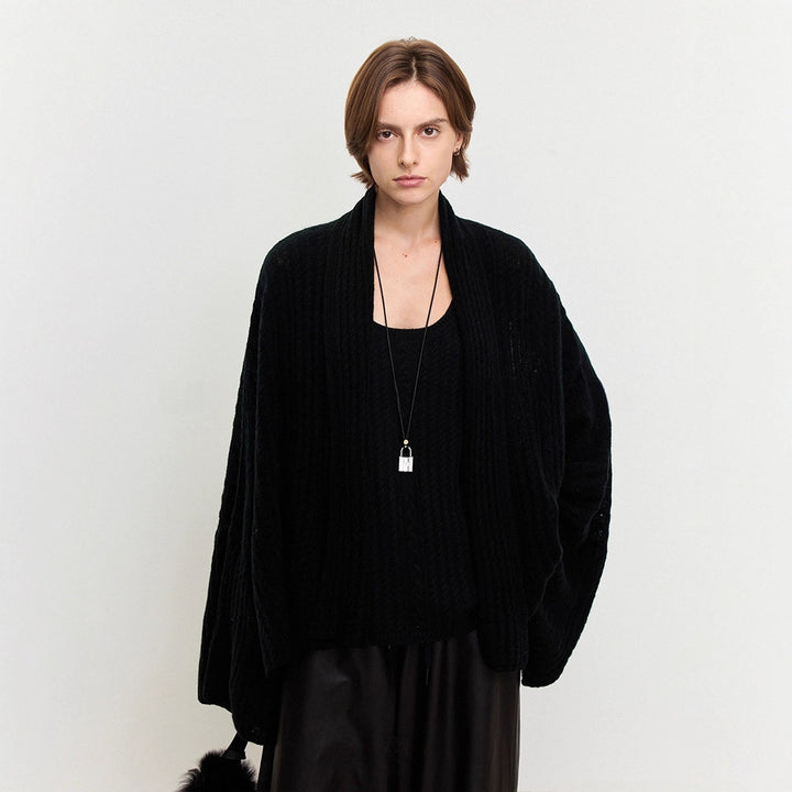Damen luftiger Strickponcho aus feiner Wolle Drune