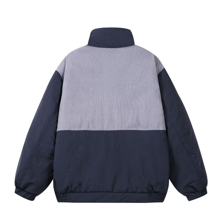 Unisex Boxy-Pufferblouson mit hohem Stehkragen, Cord-Schulterpasse und großen Pattentaschen Drune