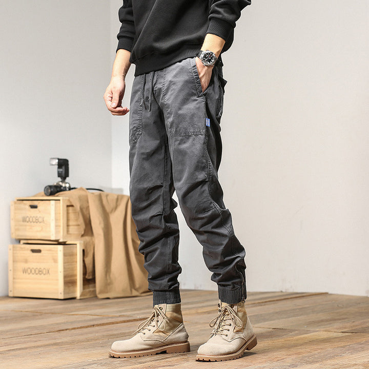 Herren Tapered-Utility-Cargohose im Joggerstil mit elastischem Comfortbund, aufgesetzten Taschen und Knöchel‑Reißverschluss Drune