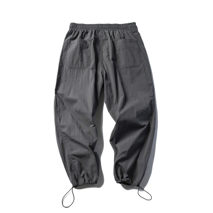 Unisex Technische Cargo-Hose im Baggy-Schnitt mit Tunnelzugbund und verstellbaren Beinabschlüssen Drune