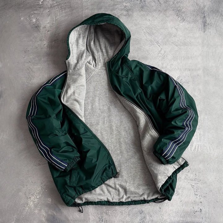 Unisex nan weit geschnittene Windjacke mit Kapuze wattiertem Fleeceinnenfutter Tunnelzugsaum und Zierstreifen an Ärmeln Drune