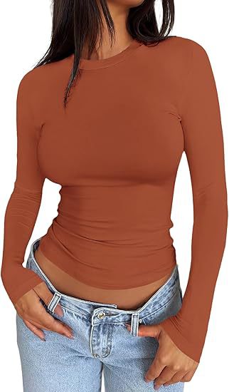 Damen Körpernahes Langarmshirt im Cropped-Look mit verlängerten Ärmeln und Daumenloch Drune