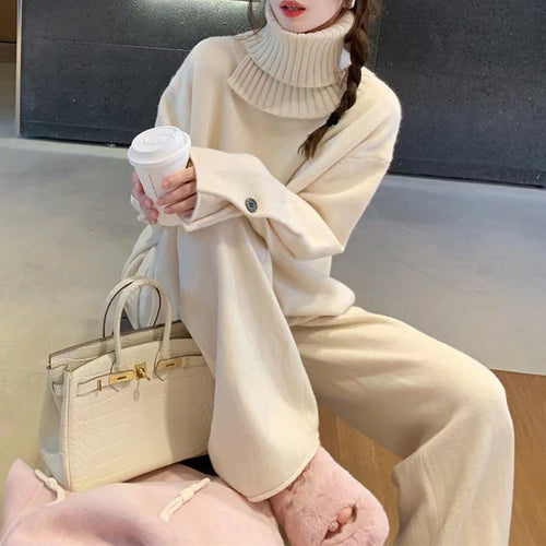 Damen gemütlicher Strickpullover mit hohem Kragen und Schulterdetails Drune