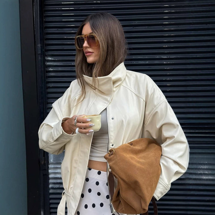 Damen Oversize Kunstlederjacke mit hohem Stehkragen und Tunnelzug Drune