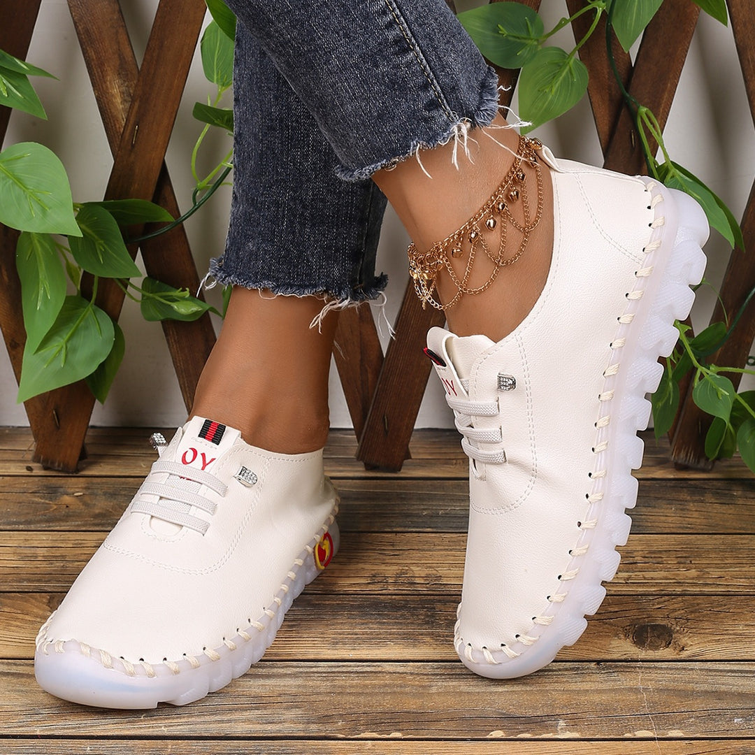 Damen Bequeme Lederoptik-Slipper mit flexibler Profilsohle und Mokassin-Naht Drune