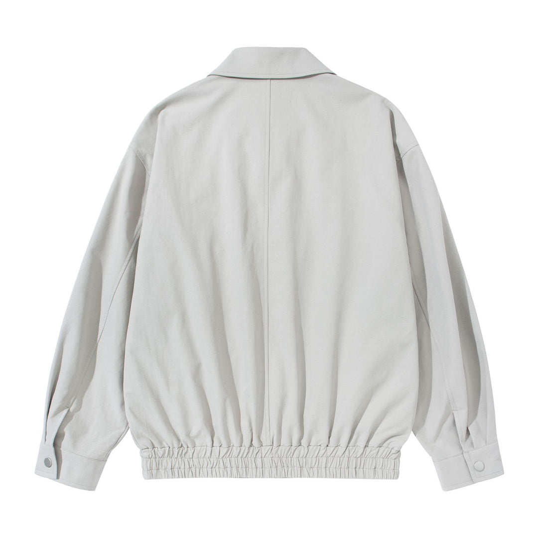 Unisex Kurz geschnittene Boxy-Blousonjacke mit Hemdkragen, verdecktem Reißverschluss und gerafftem Saum Drune