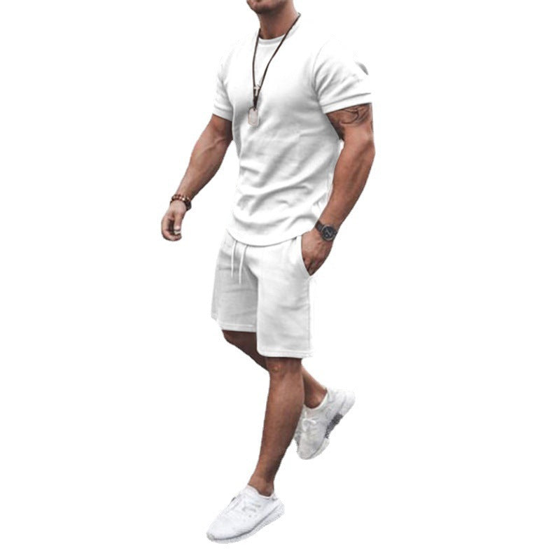 Herren nan figurbetontes Kurzarmshirt mit verstärkter Schulternaht und elastischer Kordelzug-Bermuda aus Stretchjersey Drune