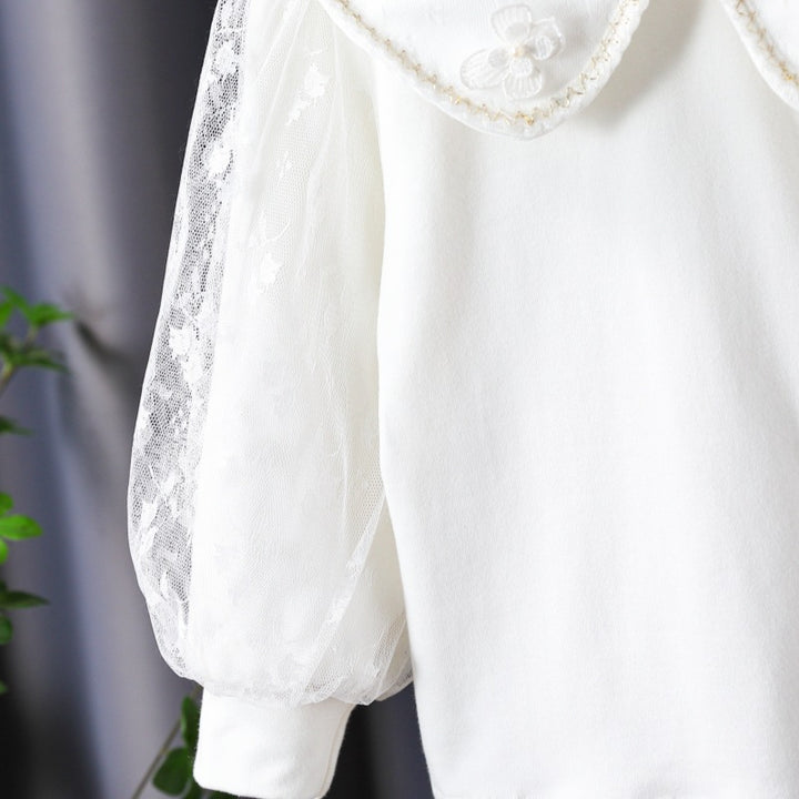 Damen Bluse mit dekorativen Blumenapplikationen und transparenten Puffärmeln Drune