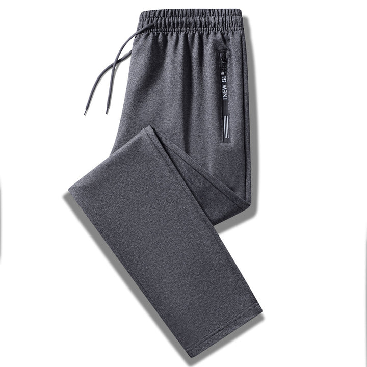 Herren Sportliche Trainingshose mit elastischem Tunnelzugbund, Reißverschlusstasche und glattem Performance‑Material Drune