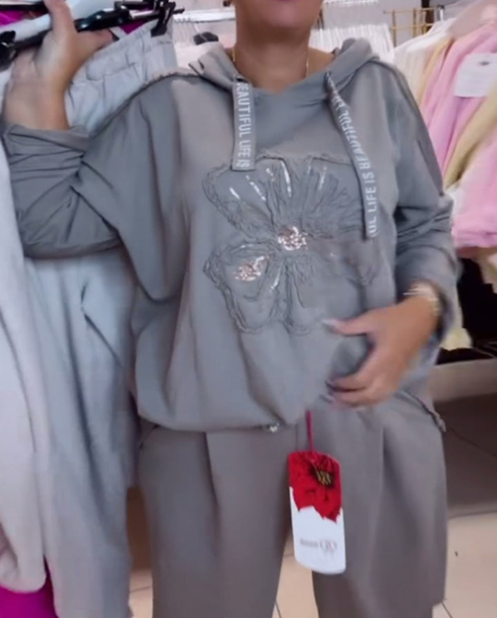 Damen nan entspanntes Lounge-Set mit Blüten-Pailletten-Hoodie, Kordelzug und weiter Bundfaltenhose Drune