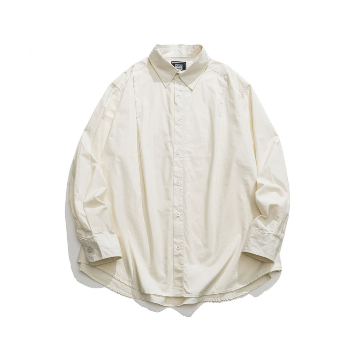 Unisex Oversized Hemdjacke mit seitlichen Zierknopfreihen und gerundetem Saum Drune