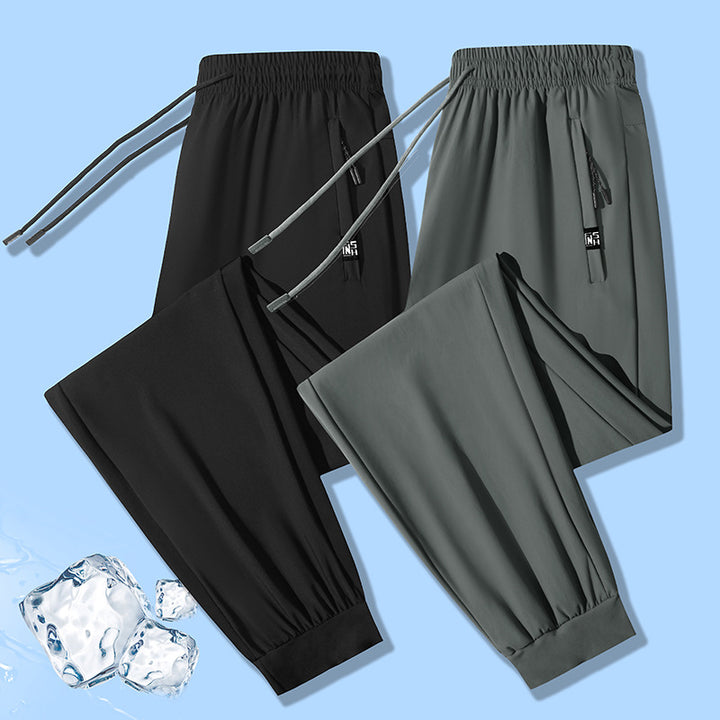 Herren urban performance Jogginghose mit elastischem Kordelbund, verdeckter Reißverschlusstasche und geradem Bein Drune