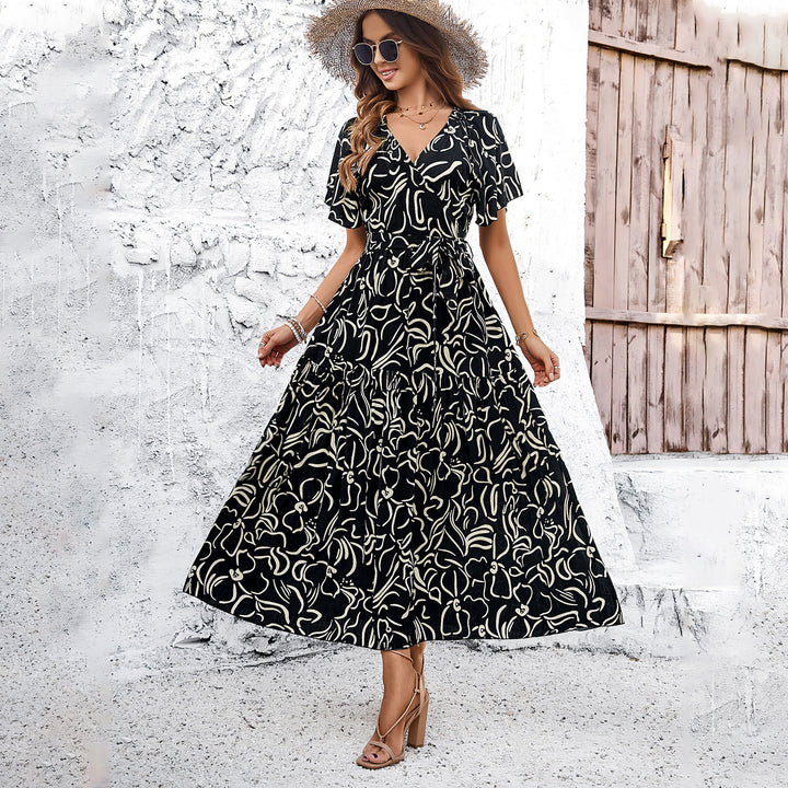 Damen Wickelmaxikleid mit luftigen Ärmeln und floralem Muster Drune