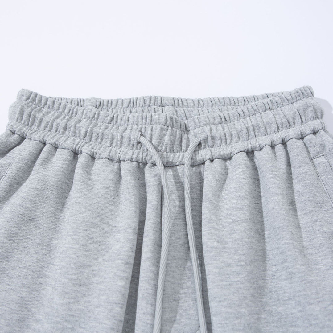 Unisex Weite French‑Terry Sweatpant mit elastischem Tunnelzugbund, Seitentaschen und verstellbarem Saum Drune