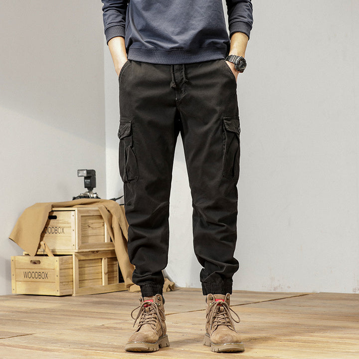 Herren Tapered Cargo-Jogger aus robustem Twill mit Tunnelzugbund, aufgesetzten Klappentaschen und gerippten Knöcheln Drune