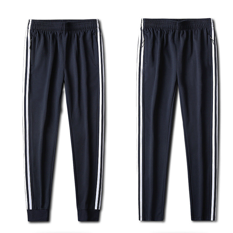Herren Slim-Fit Trackhose mit seitlichen Kontraststreifen, Reißverschlusstaschen und elastischem Bund Drune