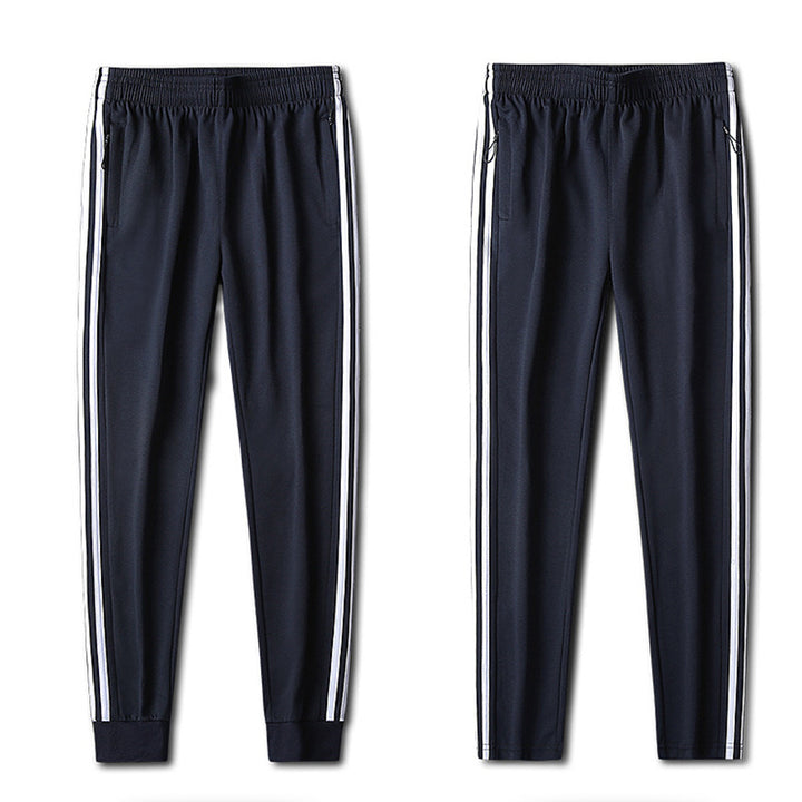 Herren Slim-Fit Trackhose mit seitlichen Kontraststreifen, Reißverschlusstaschen und elastischem Bund Drune