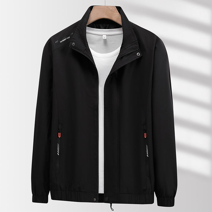Herren Leichte atmungsaktive Windjacke mit Stehkragen, Reißverschlusstaschen und Kordelzug Saum Drune