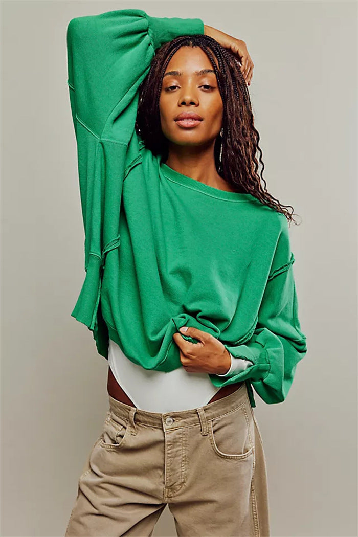 Damen oversized Sweatshirt mit Ballonärmeln, offenen Saumnähten und seitlichen Schlitzen Drune